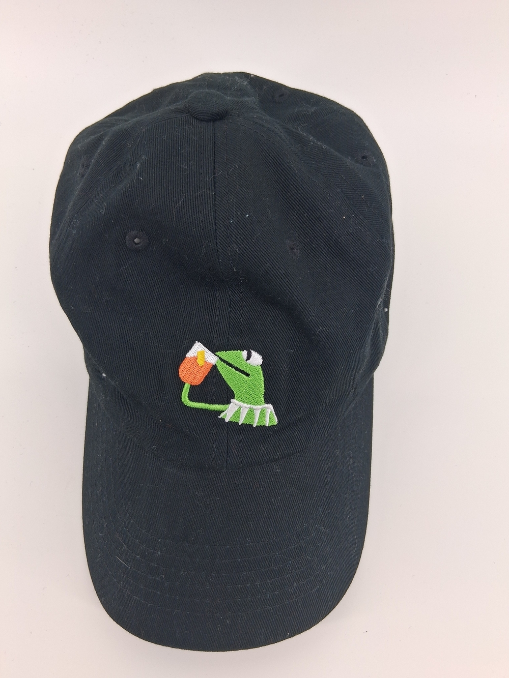 Black Cap with Embroidered Green Frog Holding Orange Cup